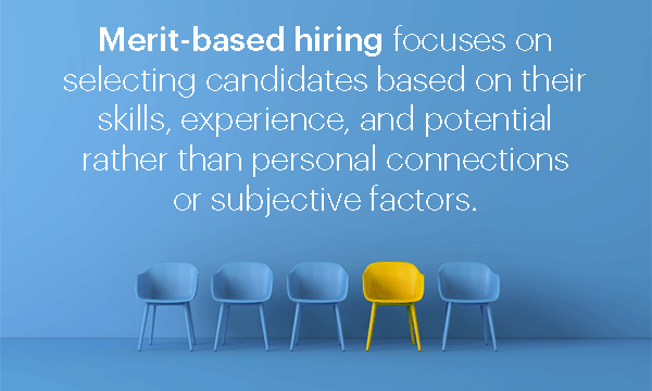 row of chairs against blue wall; all are blue except for 1 yellow chair; callout text; Merit-based hiring focuses on selecting candidates based on their skills, experience, and potential rather than personal connections or subjective factors. 